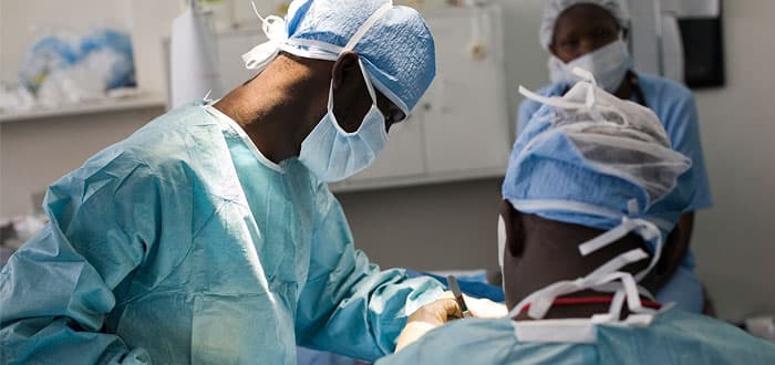 Image of a diverse group of doctors collaborating and discussing medical cases